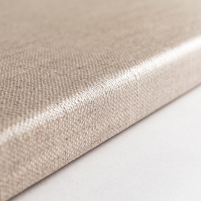 Close up of the back of the wooden frame of a Loxley Linen Clear Gesso Canvas that is 20 by 16 inches and comes in a box of 5